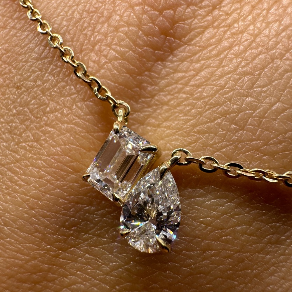 1.11 carat pear and emerald cut toi et moi necklace